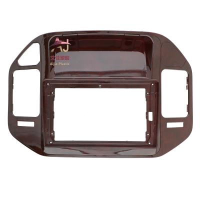 China Brief & Single color AJ-FM FOR Mitsubishi V73 Pajero 2004-2011 hot sale wood frame 9inch MitsubishiSeries car dvd video picture radio fascia for sale