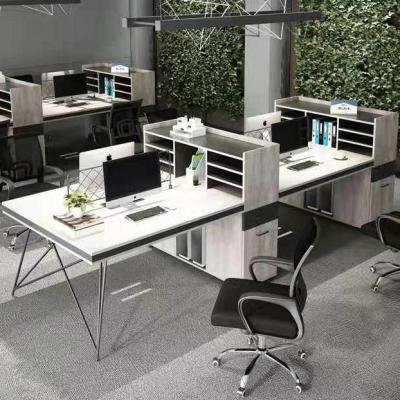 China Modern Luxury Cubic All-in-one Convertible Staff Furniture Office Studio Cubic Workstation Sections 4 Person L Shape Computer Desk with Shelf for sale