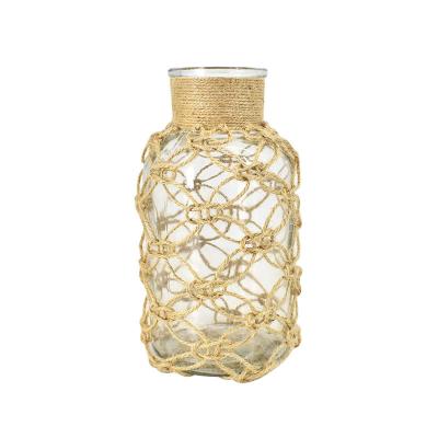 China Traditional Hand-knotted Macrame Slip Cover for Glass Vase Nordic Handwoven in Door Macrame Rope Hanger for sale