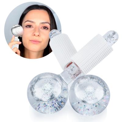 China Pore ​​Remover Reduce Puffiness Tighten Skin Face Ion EMS Freeze Massager Beauty Ice Cooling Facial Globes for sale