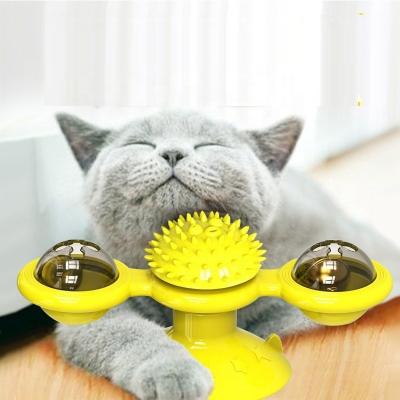 China Stocked Cat Bite Play Toy Halloween Christmas Holiday Automatic Interactive Appeasement Spin Windmill Cat Toy for sale