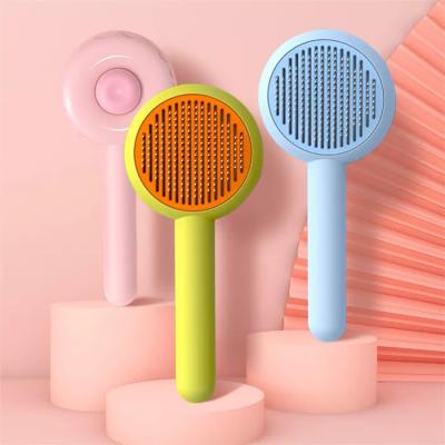 China Pet Hair Remover Comb Brush Self Cleaning Pumpkin Cat Brush for Grooming Removes 2 in 1 Pet Comb for sale