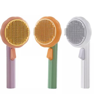 China Stocked 2 in 1 Pet Comb Hair Remover Self Cleaning Dog Pumpkin Cat Brush Comb for Pet Grooming Removes for sale