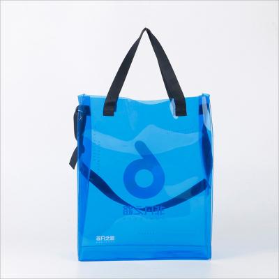 China Custom Handled OEM PVC Logo Transparent Shopping Bag With Adjustable Shoulder Strap for sale