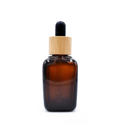 China 15ml Amber Square Shape Glass Bottles For Essential Oils for sale