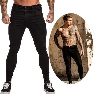 China Viable Designer Skinny Jeans Slim Fitted Dress Pants Trousers Design 3xl Exhaust Blue Black Jeans Men for sale