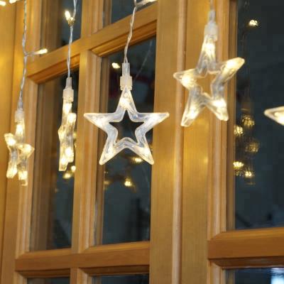 China Cheap Still Outdoor Modern Decorative LED Star Window Curtain Lights For Wedding for sale