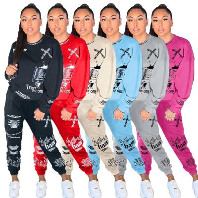 China Latest Anti-pilling Fashion Street Fashionable Clothing Letter Graffiti Print Casual 2 Piece Women Sweat Sets Tracksuit for sale