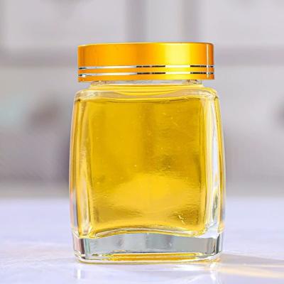 China Luxurious Food Quadrate Honey Jar Glass Jar 180oml 280ml 360ml 500ml 730ml With Metal Lid for sale