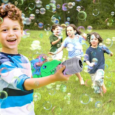 China 2022 Summer Hot Selling Dinosaur Toys Plastic Gun Children's Electric Porous Belt Music Bubble Machine Toy for sale