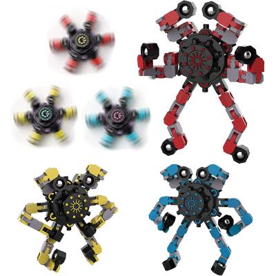 China Plastic Educational Toys Fingertip Spinner Spining Top Toys Deformable Person Sensory Toys Bearing Robot Spiral Spinner for sale