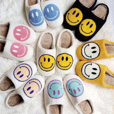 China Home Slippers Plush Purple Plush Soft Smiley Face Slippers Women Warm Unisex Anti-slippery Cotton Slippers for sale