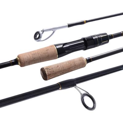 China New Carbon Fishing Rod 4 Section Guide Ring Travel Lure Rods 2.1m High Carbon Medium Action Portable Spinning Rod for sale