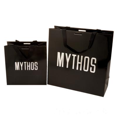 China Recycled Materials Custom Your Logo Black Shopping Big Paper Bag Wholesale With Handle for sale