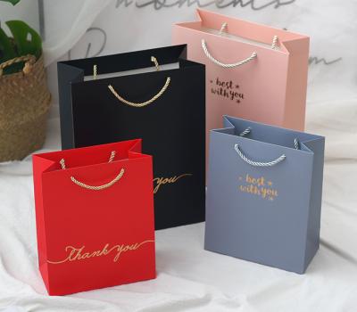 China Recyclable Custom Exquisite Gift Bag Dark Blue Bottom Gift Bag Paper Bag for sale