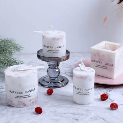 China Body Shape Christmas Decoration Suppliers Wedding Decoration Soy Wax Cube Pillar Candle With Flowers Inside Dried Flower Dry Candles for sale