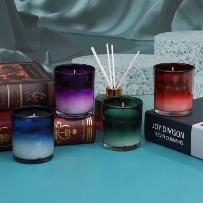 China Gradient Color Wholesale Aromatherapy Essential Oils Luxury Long Burning Organic Glass Jar Scented Scent Aroma Candles for sale