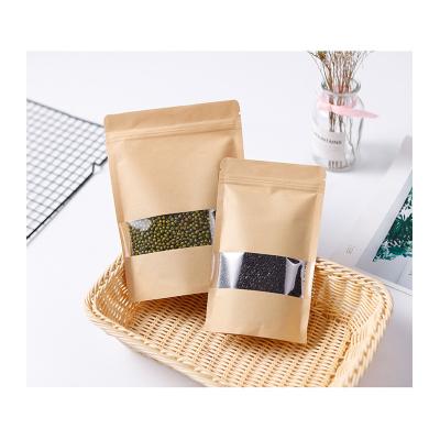 China Recycled Materials Stand Up Zipper Brown Resealable Kraft Paper Food Storage Packaging Ziplock Heat Seal Pouches Bags With Clear Window for sale