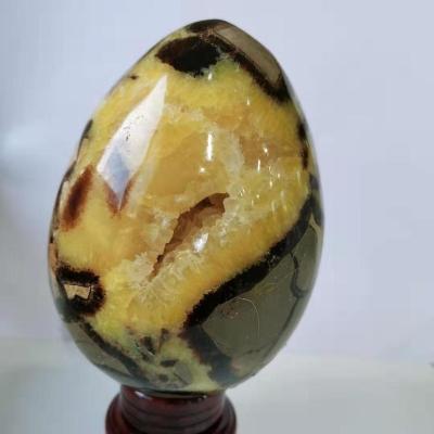 China Natural Yellow Stone Eggs Crystal Carved Decoration Egg from Europe Septarium for sale