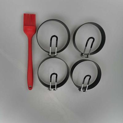 China Viable Egg Ring 4-Pack Stainless Steel Egg Ring With Anti-scald Handle With An Oil Brush for sale