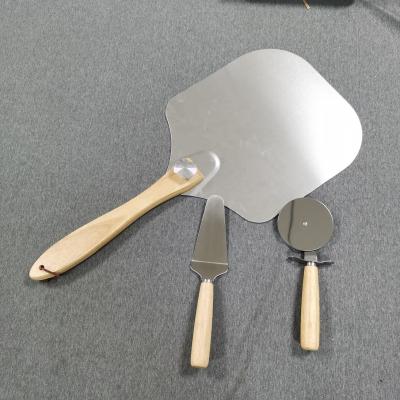 China Disposable pizza peel aluminum metal pizza paddle with foldable wooden handle and pizza wheel cutter for sale