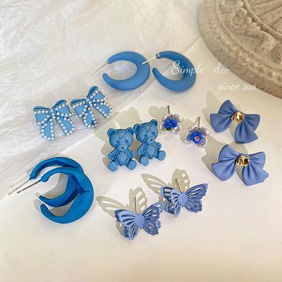 China Kaimei FASHIONABLE 925 Retro Silver Blue Temperament Bow Pearl Fashion Needle Earrings Women Earrings for sale