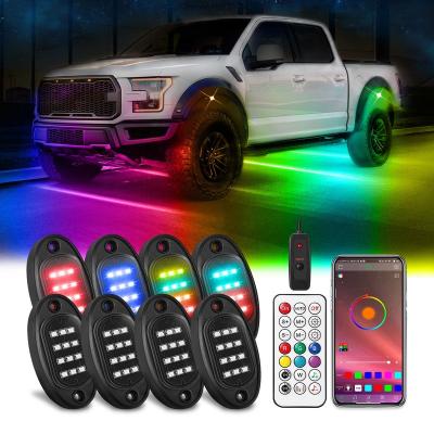 China 256 Chasing Effect Modes Dream Color LED Rock Lights,Chasing Effect 8 Pods Underglow Light with APP/RF Remote Control for Jeep Truck Underbody Waterproof for sale