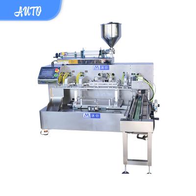 China Hot Product Powerful Milk Liquid Products Paste Filling And Sealing Machine for sale