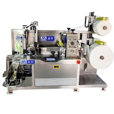 China Products Face Sheet Mask Machine Non-woven Machine Folding All-in-one Facial Packaging Machine for sale