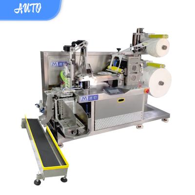 China Product Safety and Reliability Hot Mask Cloth Cutting and Folding Machine for sale