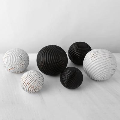 China Modern decoration home crafts accessories subtract creative retro hotel black white porch decor ball resin ornaments for sale