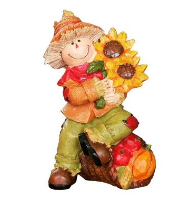 China Worlwide Resin Boy Window Display Table Decoration Harvest Thanksgiving Pumpkin Home Living Room Decoration for sale