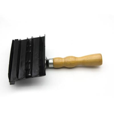 China Horse old style metal curry comb with wooden handle for horses for sale