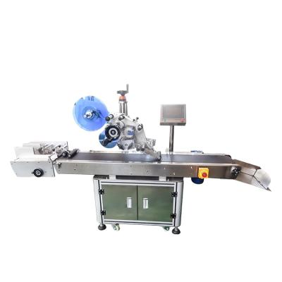 China Reliable Full Automatic Flat Air-absorption Labeling Machine Paper Card Box Auto Paging Automatic Labeling Machine for sale