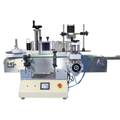 China 2022 New Desktop Vertical Food Labeling Machine With Conveyor Belt Round Bottle Labeling Machine for sale