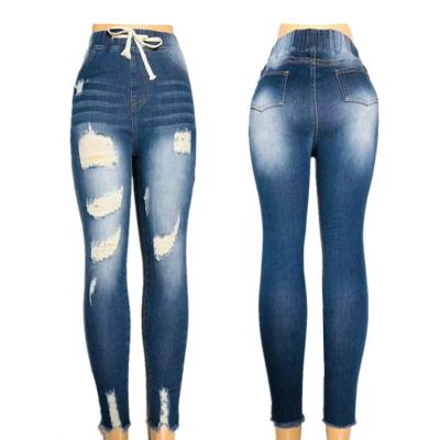 China Customizable hot sale women's fashion molded stretch QUICK DRY ripped tassel ripped small foot jeans for sale