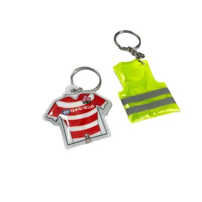 China Promotional Custom Reflective Vest Shape Led Key Chain Light Promotional Led Keychain for sale