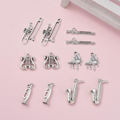 China Small Pendant Jewelry Accessories 24pcs Tibetan Silver DIY Alloy Casual/Sporting Retro Pendant Musical Instrument for sale