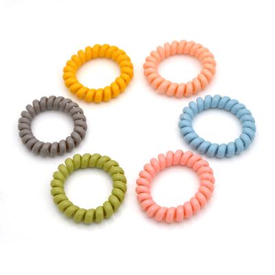 China Rondom Environmental Friendly Mix Colors Amazon Seller Resin Scrunchies Elastic Band Custom Hot Spiral Ring Hair Ties Coil for sale