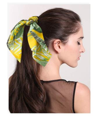 China Environmental Friendly New Arrival Long Style Ribbon Hair Bands With Leaf And Tassels Hair Elastic Tropical Hair Band for sale