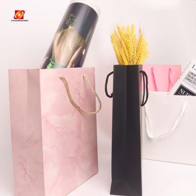 China Recycled Materials Brand New Shopping For Clothes Paper Bags Packaging Bag Food for sale