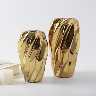 China Free sample gold shape vortex vase btabletop luxury hotel office ceramic fancy ware decoration ceramic vases vases for flower for sale