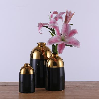 China Modern Antique Handwork Flower Vase Gold Black Ceramic Flower Vase For Decor for sale