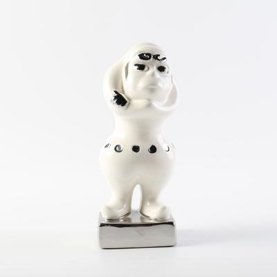 China Simply Cute Little Man Ceramic Figure Statue Modern Simple Home Decoration For Gifts for sale