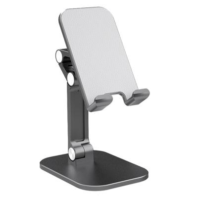 China Small Height Adjustable Universal Adjustable Plastic Table Cell Phone Stand Mobile Holder for sale