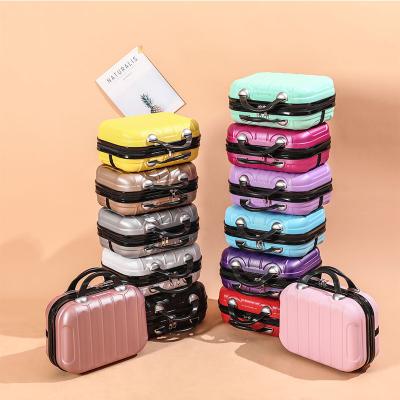 China Fashion FANLOSN Hot Sale Portable 14 Inch ABS Mini Travel Makeup Bags Suitcase Scratch-resistant Box for sale