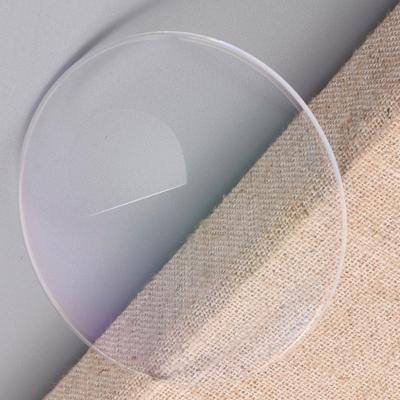 China Wholesale Flat Surface Optical Monocle Lenses Semi Finished 1.499 Index Flat Surface White UC Bifocal Lenses for sale