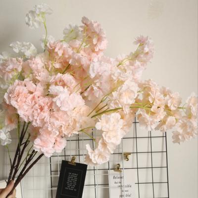 China Beautiful Colorful Indoor Wedding Decoration Silk Tree Arch Flowers Artificial Cherry Blossom Tree Branches for sale