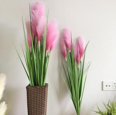 China Hot Wholesale Realistic Party Wedding Head Family Tubular Grass 5 Simulation Artificial Flower Outdoor Decoration for sale