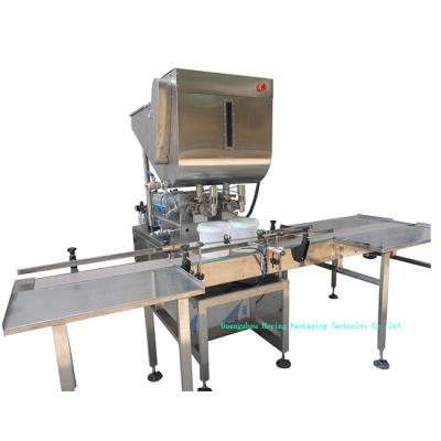 China Automatic 2 Head Food Fruit Canned Mango Pulp Filling Machine By Piston Pump for sale